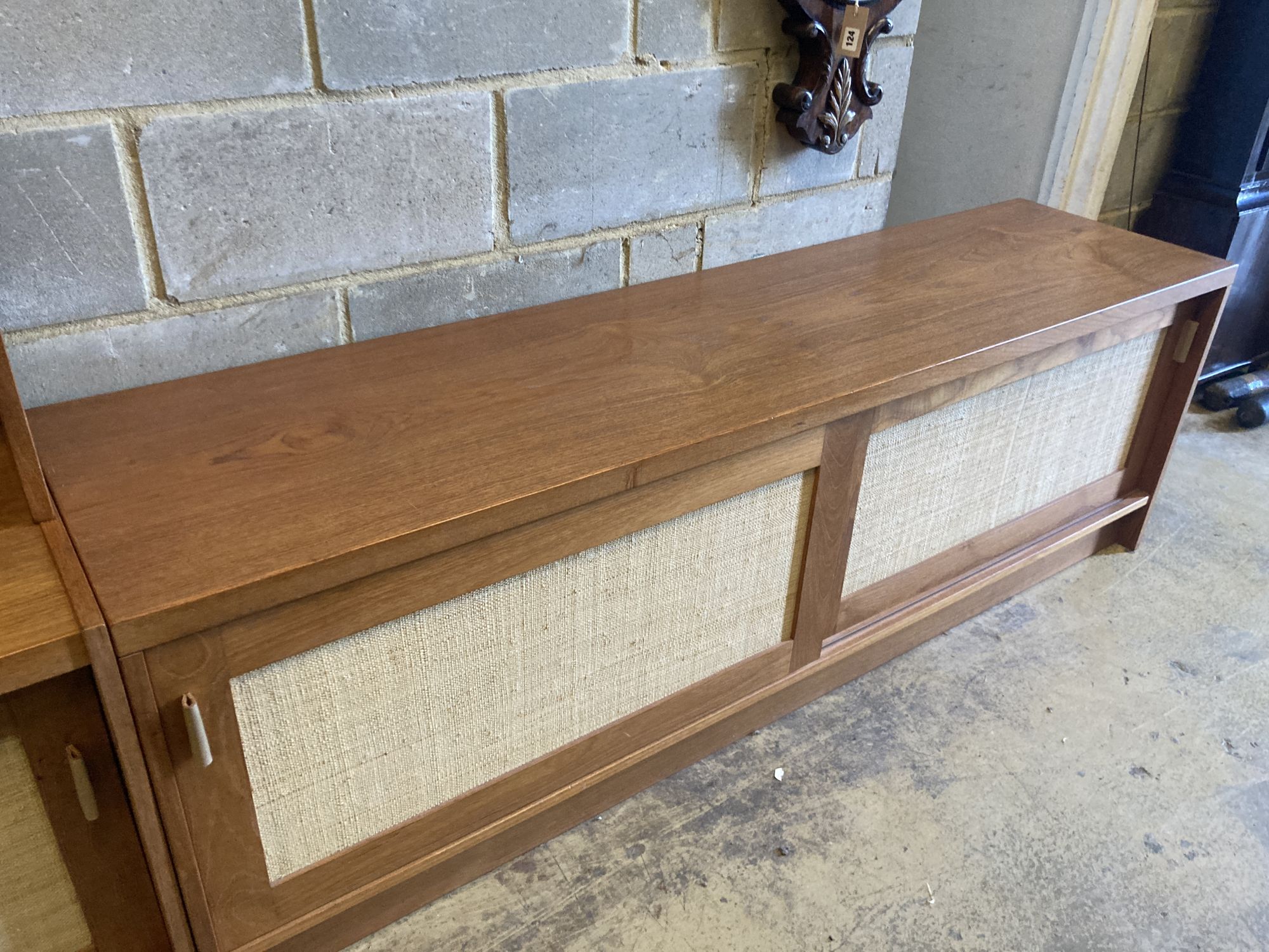 Three near-matching teak side cabinets,